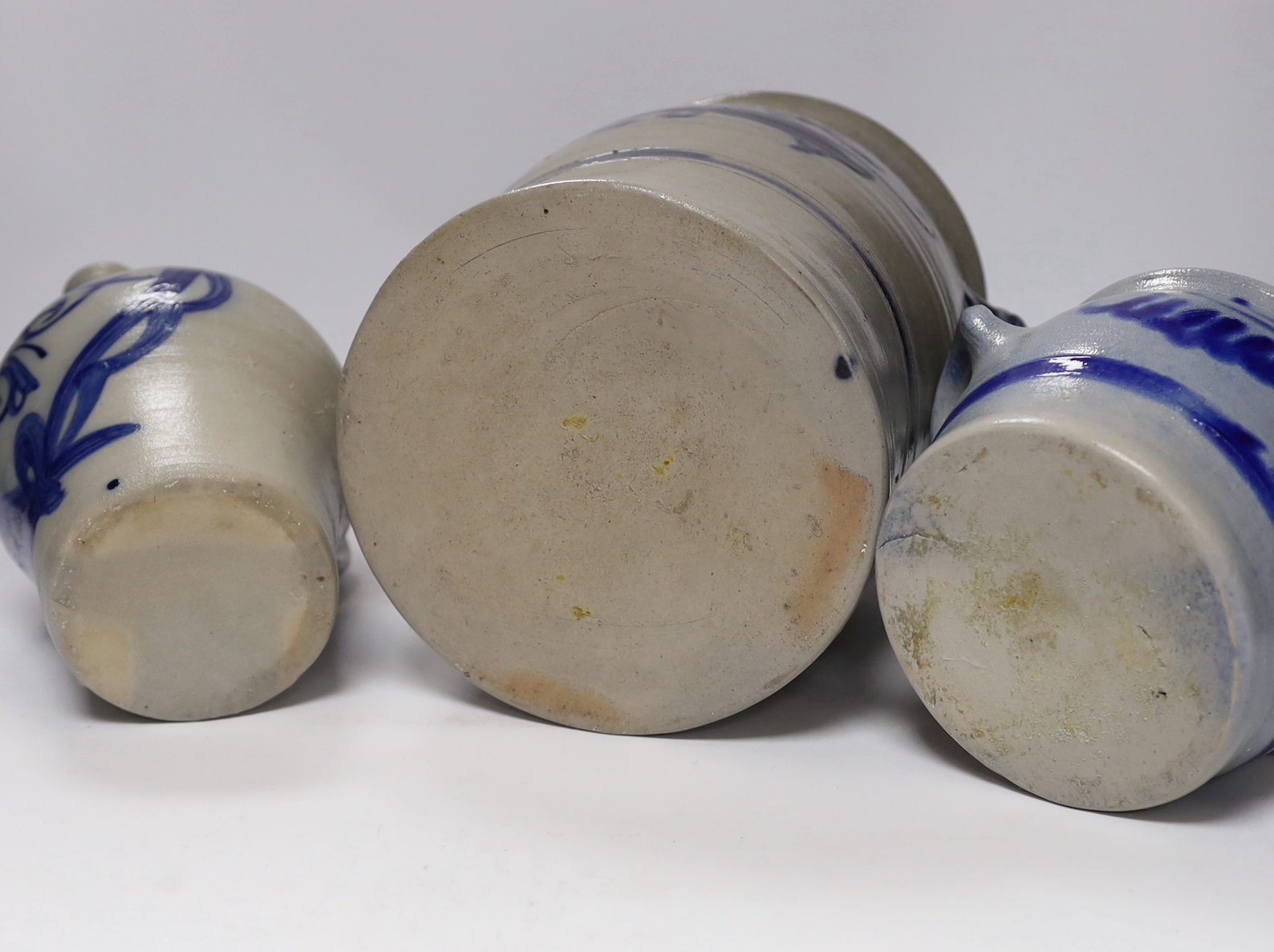 Three 19th century German saltglaze vessels, 23cm